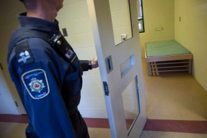 A corrections officer opens the door to a cell in the segregation unit at the Fraser Valley Institution for Women during a media tour, in Abbotsford, B.C., on Thursday October 26, 2017.