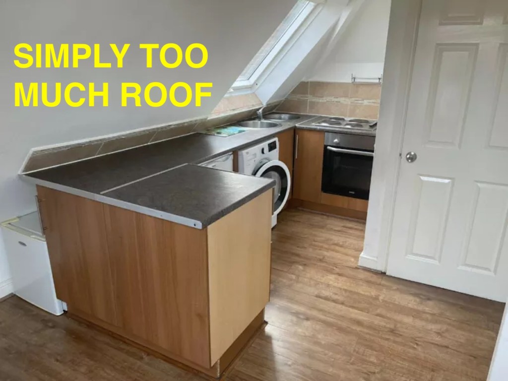 A small kitchen cut in half by a roof in Sherwood, Nottinghamshire