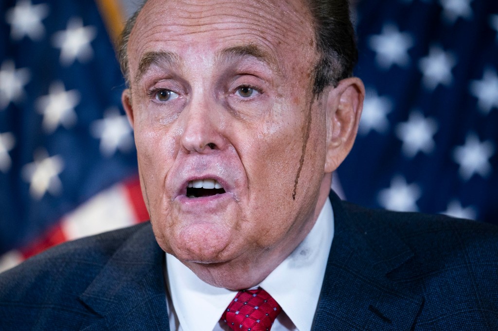 Former New York City Mayor Rudy Giuliani, lawyer for U.S. President Donald Trump, speaks during a news conference, Nov. 19, 2020. (Sarah Silbiger for The Washington Post via Getty Images)