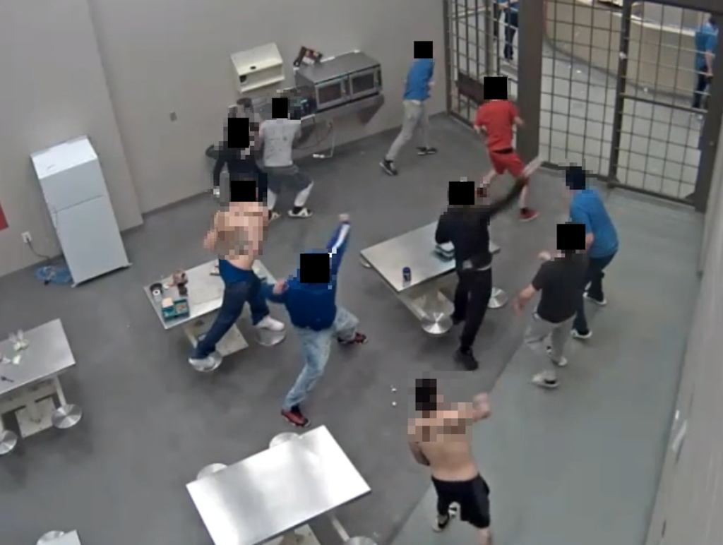 CCTV footage of inmates throwing food at the Edmonton Prison.