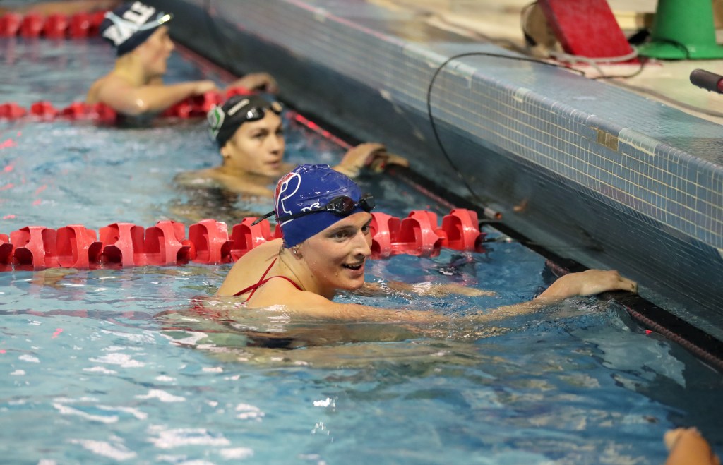 Lia Thomas smiles after winning the 200 meter freestyle on the campus of the University of Pennsylvania on January 8, 2022 (Hunter Martin/Getty Images)