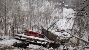 Vehicles including a Port Authority bus are left stranded after a bridge collapsed along Forbes Avenue on January 28, 2022 in Pittsburgh, Pennsylvania (Jeff Swensen/Getty Images)