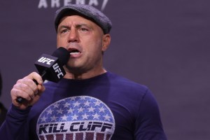 Joe Rogan introduces fighters during the UFC 269 ceremonial weigh-in at MGM Grand Garden Arena on December 10, 2021 in Las Vegas, Nevada. (Carmen Mandato/Getty Images)