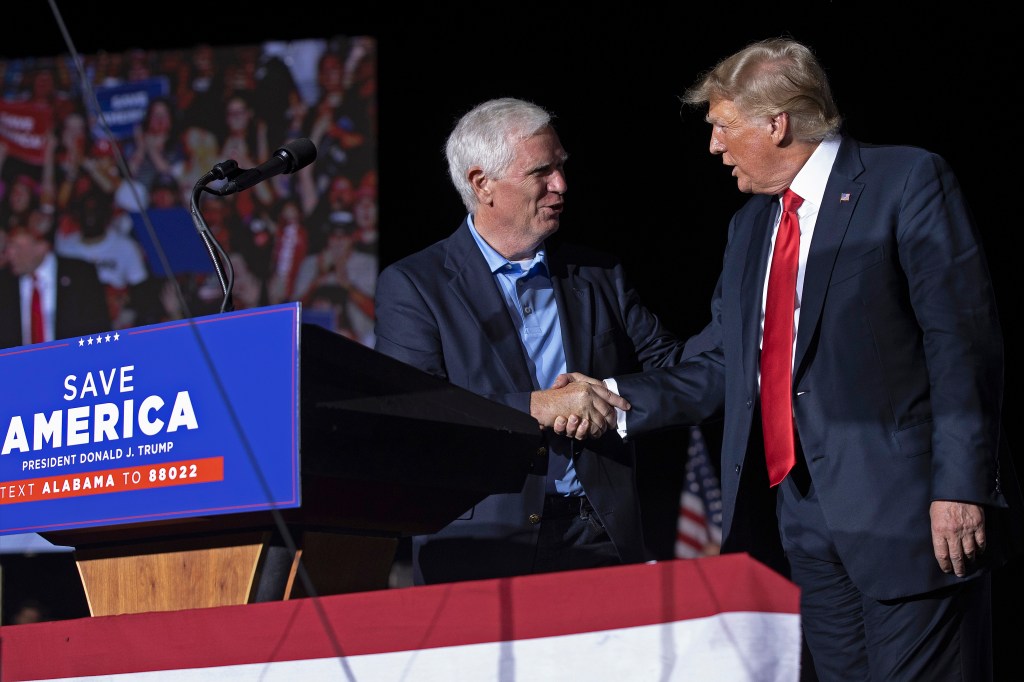 Former U.S. President Donald Trump (R) welcomes candidate for U.S. Senate and U.S. Rep. Mo Brooks (R-AL) to the stage during a "Save America" rally at York Family Farms on August 21, 2021 in Cullman, Alabama.