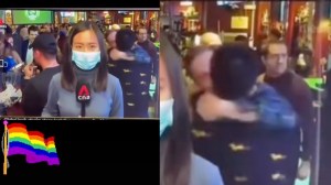 Singapore news show on Channel News Asia goes viral after two men spotted kissing in background of Beijing Winter Olympics report.