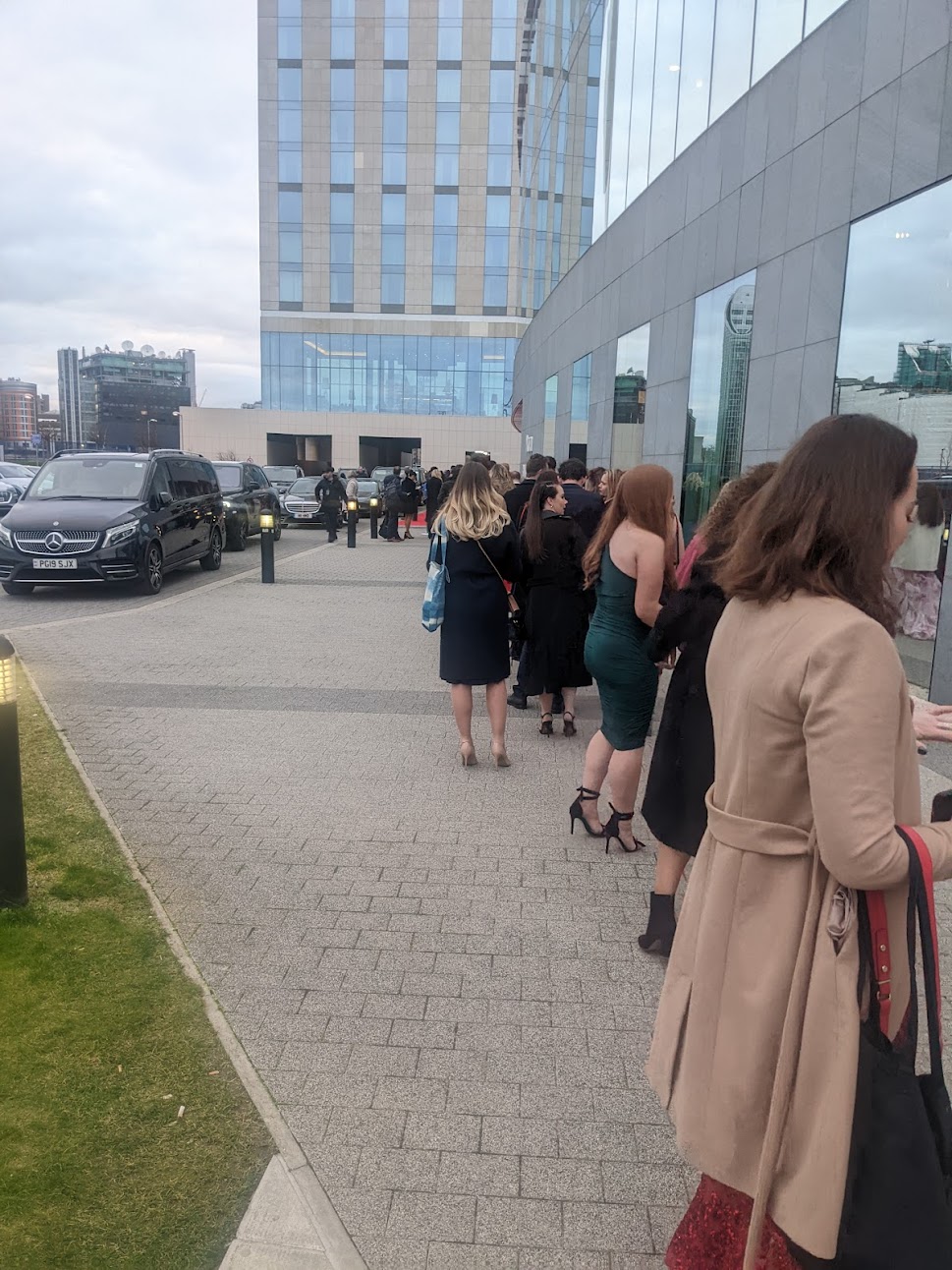 People queueing outside for the 2022 Brit Awards at the O2.