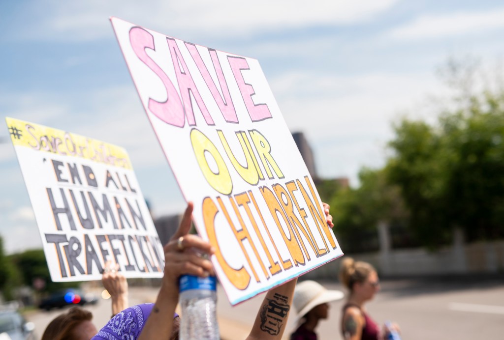 People march during a "Save the Children" rally outside the Capitol building on August 22, 2020 in St Paul, Minnesota. (Stephen Maturen/Getty Images)