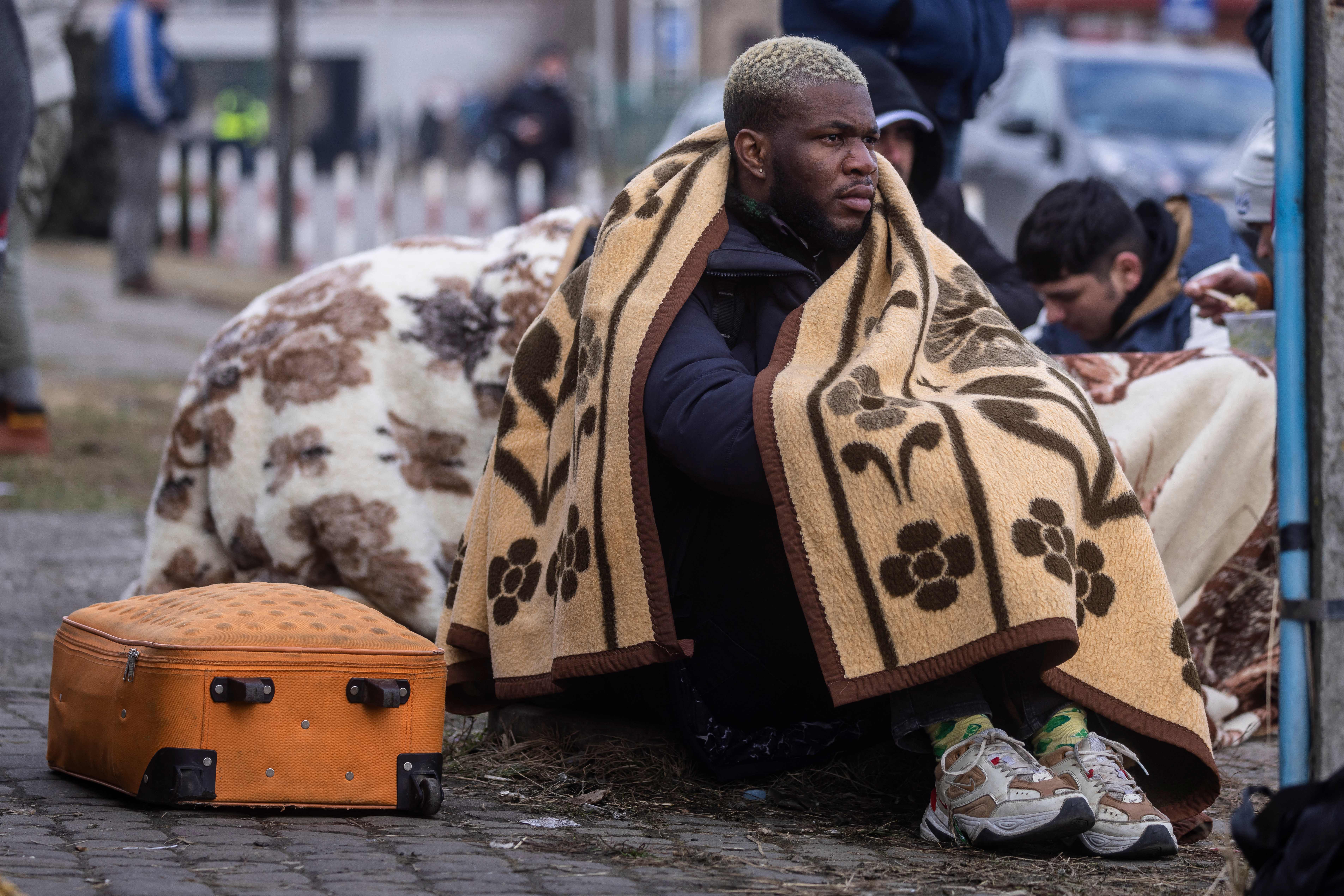 Refugees are seen at the Medyka pedestrian border crossing fleeing the conflict in Ukraine.