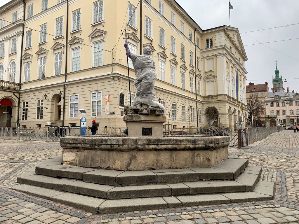 ​A wrapped-up statue in Lviv, Ukraine