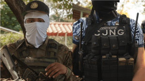 A gunman and a commander of the CJNG in Michoacán in a photograph taken last year. (Photos by Miguel Fernández-Flores)