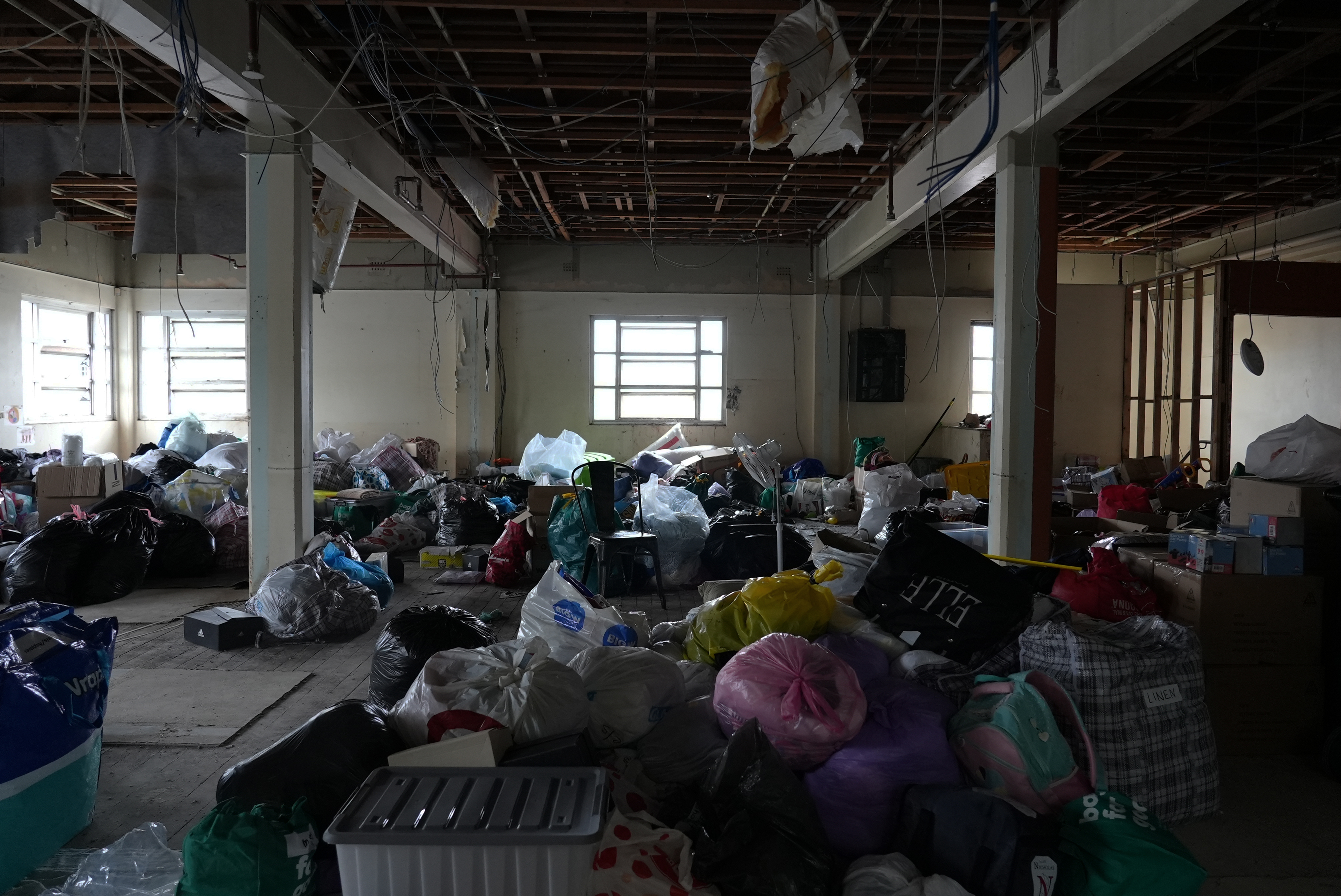 Donations fill the building that once played host to the Koori Mail's offices. Photo by Nick Wray/VICE