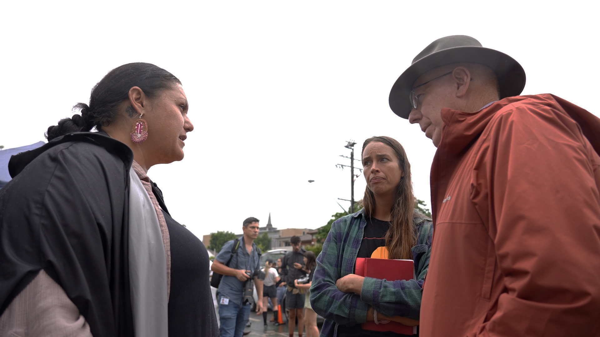 Naomi Moran (left) and Ella Bancroft (centre) receive a visit from Governor General David Hurley at Koori Mail Headquarters. Photo by Nick Wray/VICE