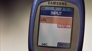 A Samsung phone with the text LOL