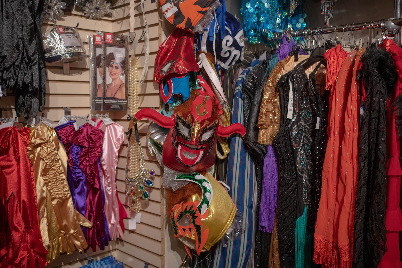 Wrestling masks hung up in So High Soho. Photo by Aiyush Pachnanda.