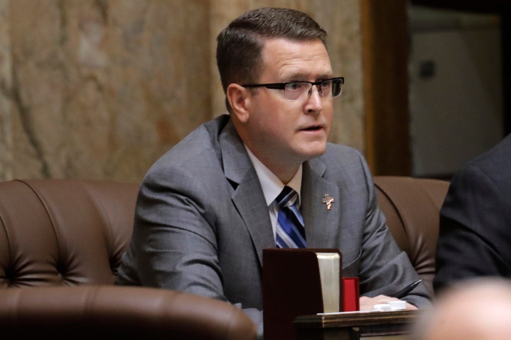 Former Washington state Rep. Matt Shea, R-Spokane Valley, listens to testimony on the House floor at the Capitol in Olympia, Wash on February 19, 2020.