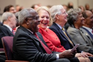 Associate Supreme Court Justice Clarence Thomas sits with his wife Ginni Thomas at the Heritage Foundation on October 21, 2021 in Washington, DC.