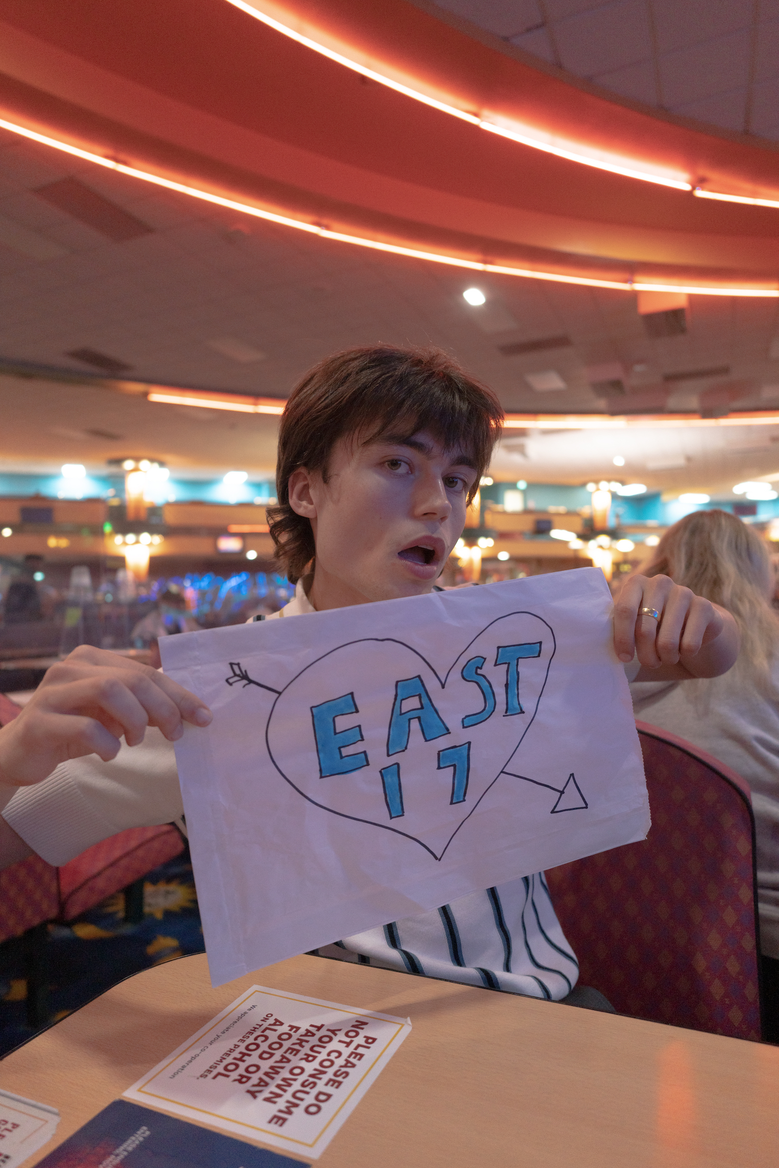 The author holding up a homemade East 17 sign