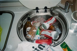 A sink full of beer cans, bottles and snacks. Photo by Bob Foster.