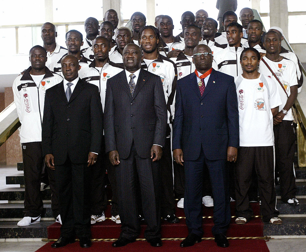 Cote D’Ivoire president Laurent Gbagbo poses for a picture with the 2006 World Cup football team in Abidjan