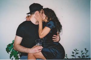 A young couple snogging. Photo by Sian Bradley.