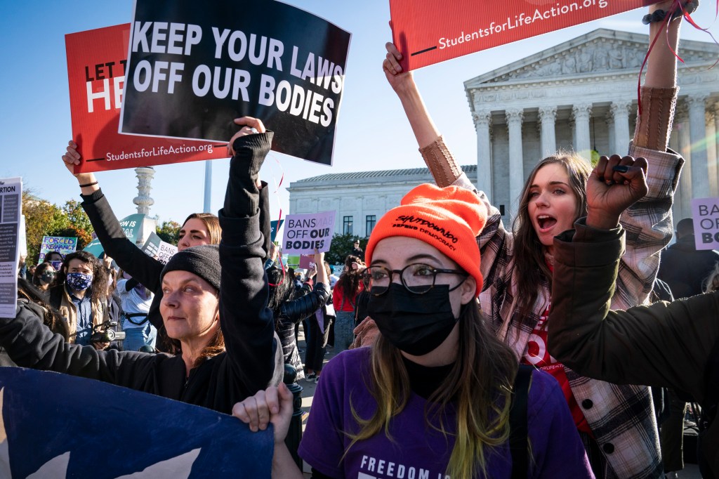 Anti-abortion and pro-abortion protestors gather outside the Supreme Court on Nov. 01, 2021 in Washington, DC.