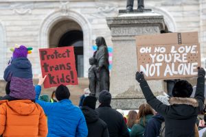 ​People rally in Minnesota to support trans kids.