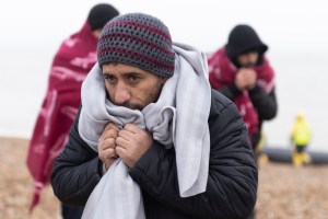 I migrant arrives on a beach in souther England in 2021. Photo: Dan Kitwood/Getty Images