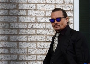 Johnny Depp steps outside court during trial over whether Amber Heard defamed Depp on April 19, 2022 in Fairfax, Virginia.