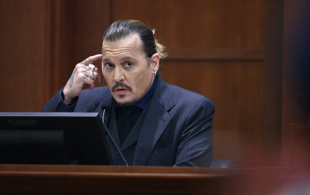 Actor Johnny Depp testifies in the courtroom at the Fairfax County Circuit Court in Fairfax, Va., Thursday, April 21, 2022.