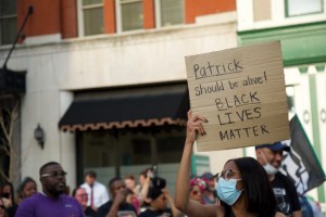 Protestors demonstrate on behalf of Patrick Lyoya, who was killed by cops in Grand Rapids, Michigan, in April.