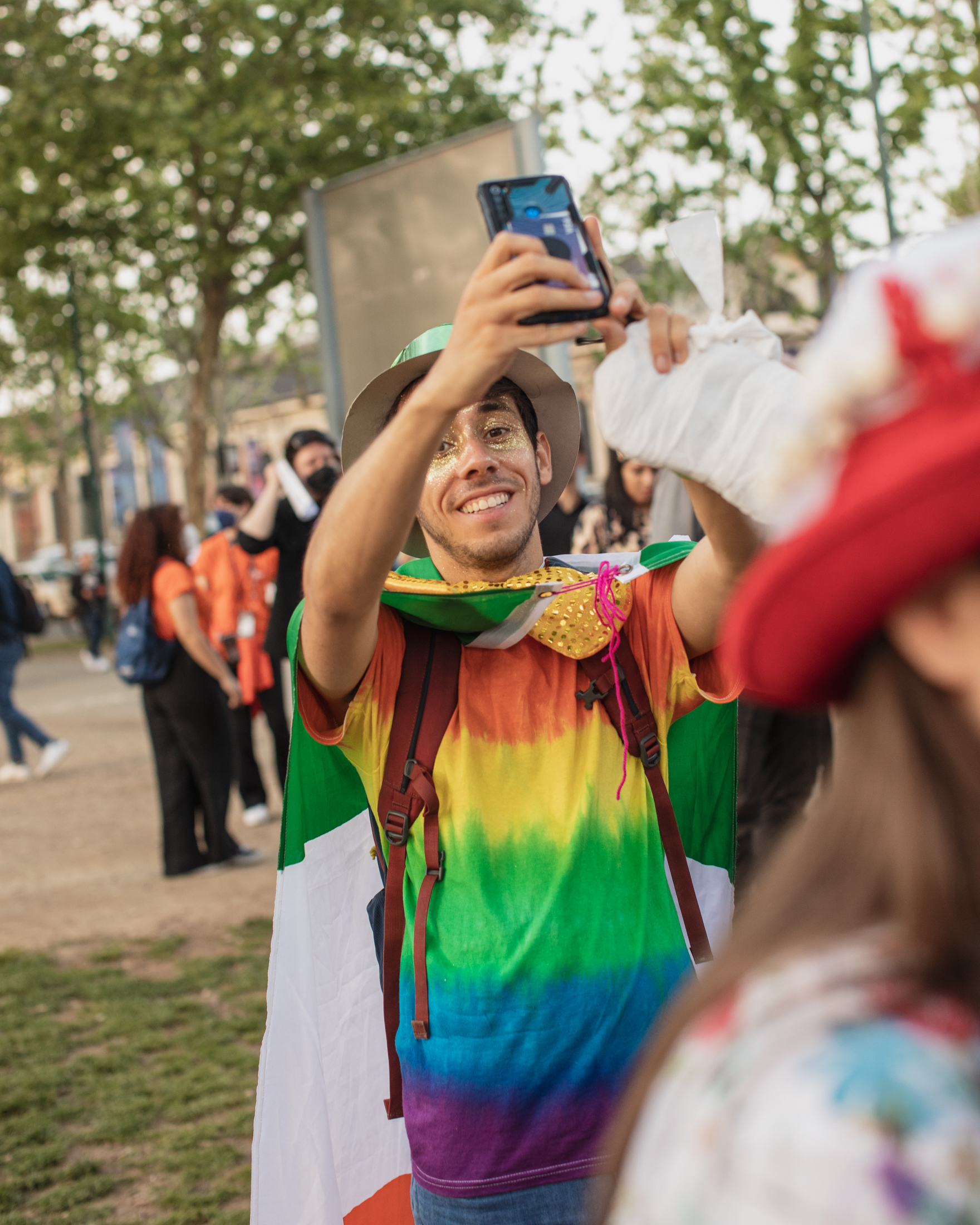 A Eurovision 2022 fan in Turin from Ireland in a rainbow shirt