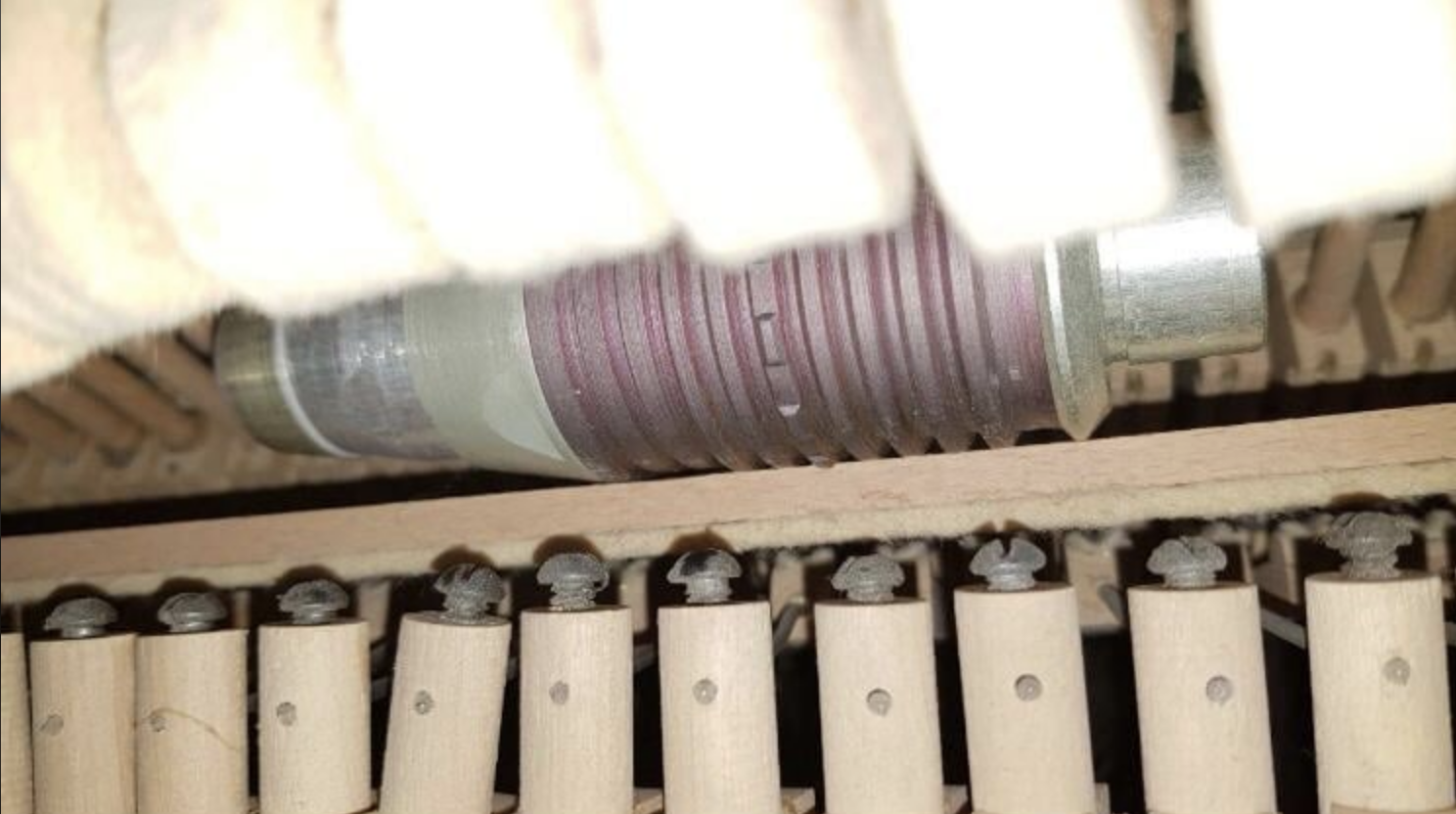 A VOG-25P grenade discovered inside the piano used by 10-year-old Darinka Monko in Bucha, Ukraine. (Courtesy Tatiana Monko)