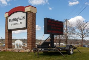 A sign for The Smithfield Foods pork processing plant in South Dakota, one of the countrys largest known Coronavirus clusters, is seen on April 20, 2020 in Sioux Falls, South Dakota. (Kerem Yucel/AFP via Getty Images)