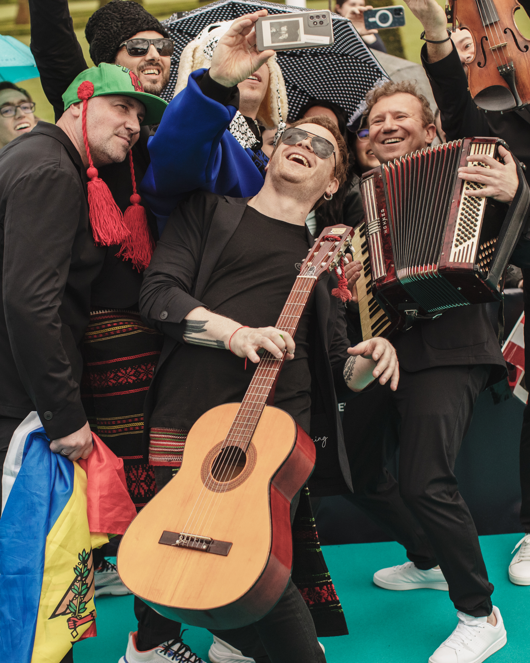 Eurovision 2022 in Turin, Italy: Fans posing with a contestant