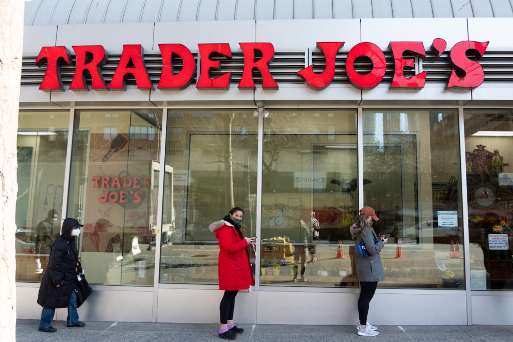 People stand in line outside Trader Joe's in Kips Bay amid the coronavirus pandemic on March 19, 2021 in New York City. (Noam Galai/Getty Images)