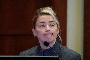 Actor Amber Heard testifies in the courtroom at the Fairfax County Circuit Courthouse in Fairfax, Virginia on May 16, 2022.