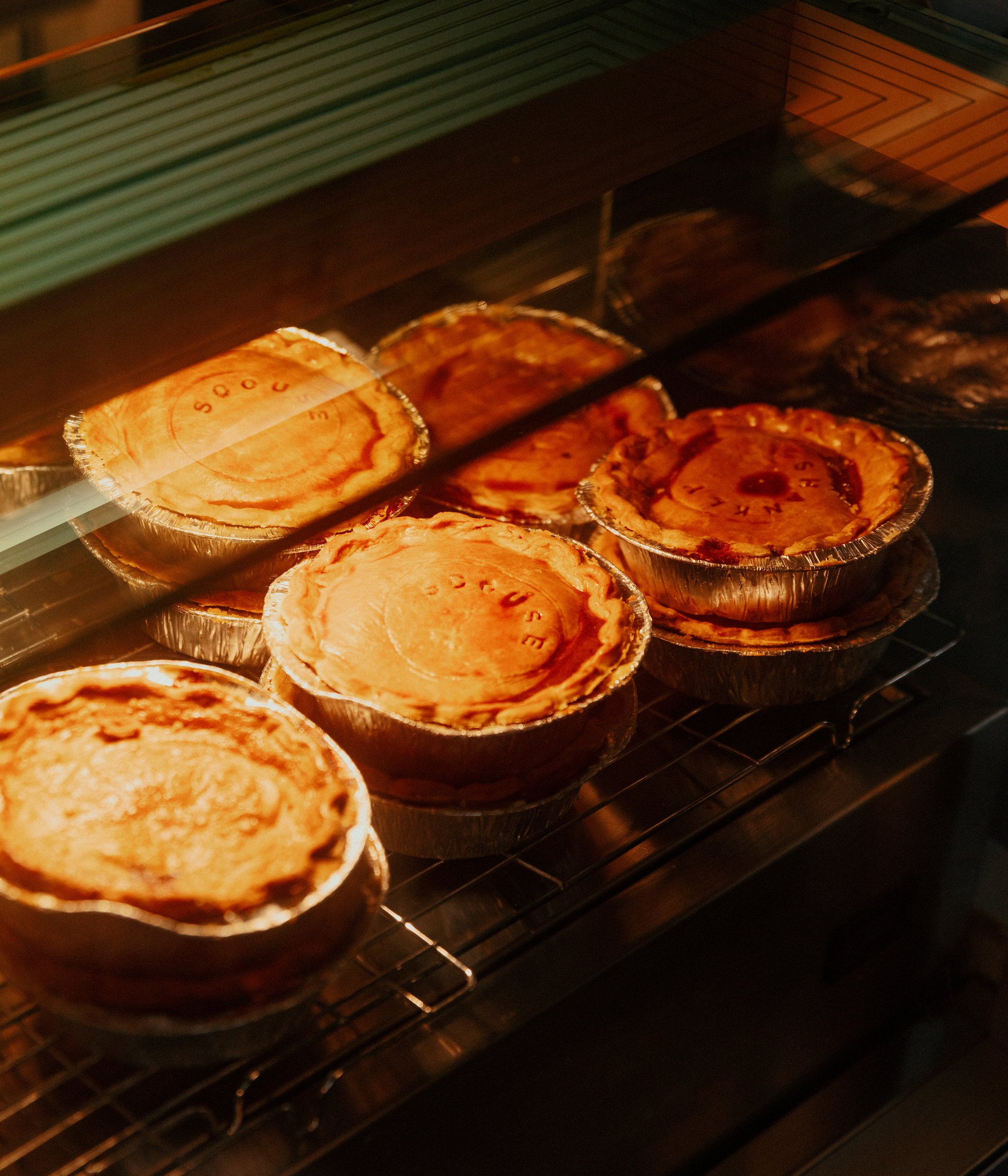 Pies filled with scouse in an oven