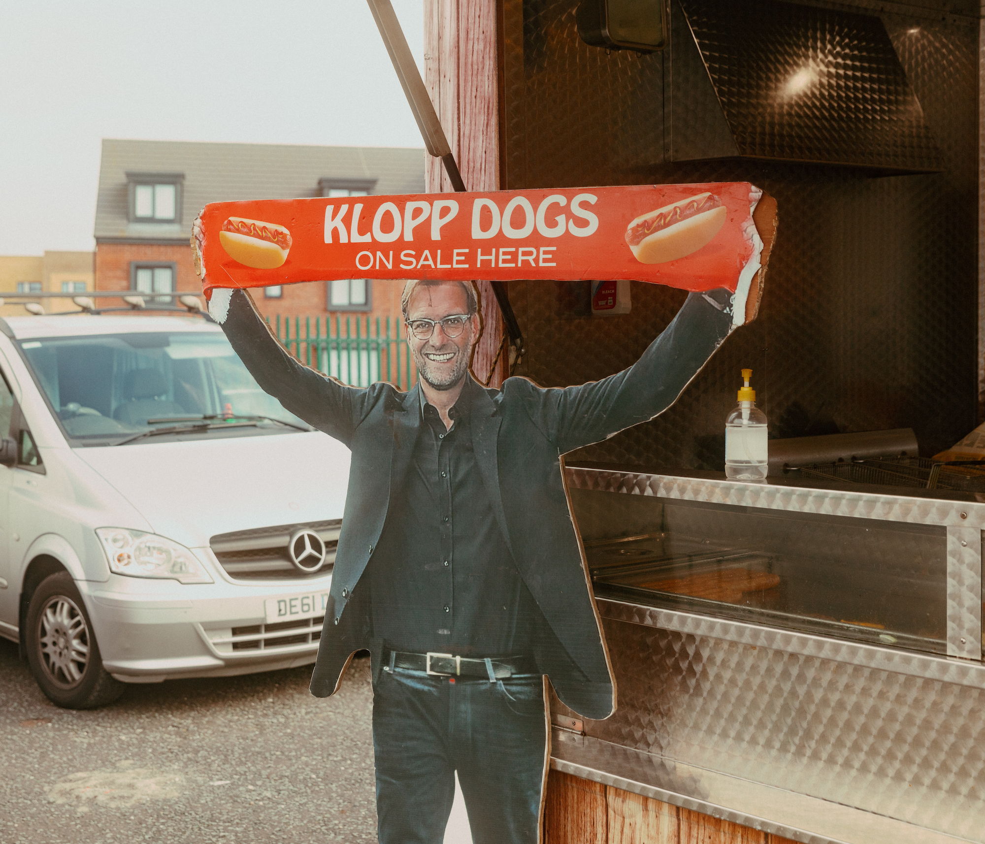 A cardboard cutout of Jurgen Klopp advertising hot dogs