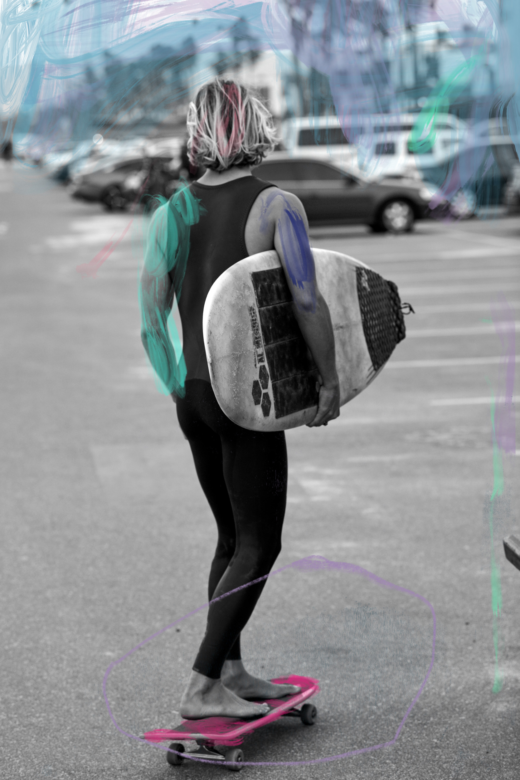 Venice Beach, California: A surfer rides a skateboard while holding a surfboard. Photo by Matthew Brookes, from Into the Wild, published by Damiani​