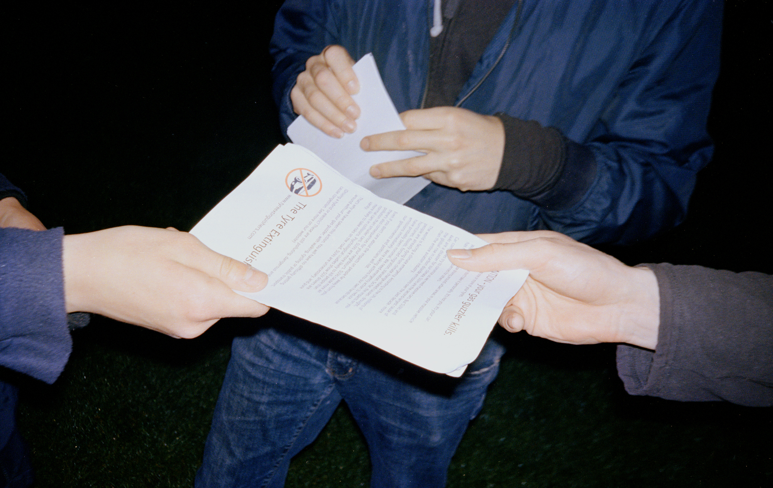 The Tyre Extinguishers distributing leaflets to members.