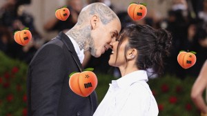 Kourtney Kardashian and Travis Barker kiss surrounded by peaches