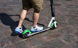 ​Someone riding a Lime scooter in Denver. Getty Images