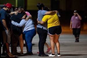 A family grieves outside of the SSGT Willie de Leon Civic Center following the mass shooting at Robb Elementary School on May 24, 2022 in Uvalde, Texas. (Brandon Bell/Getty Images)