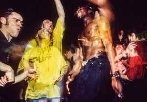 Three ravers dancing at Castlemorton, photo by Alan Lodge