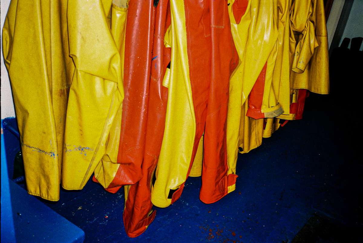 Ostend, fishing, photography - Close-up photograph of yellow and orange rubber fishing clothing.