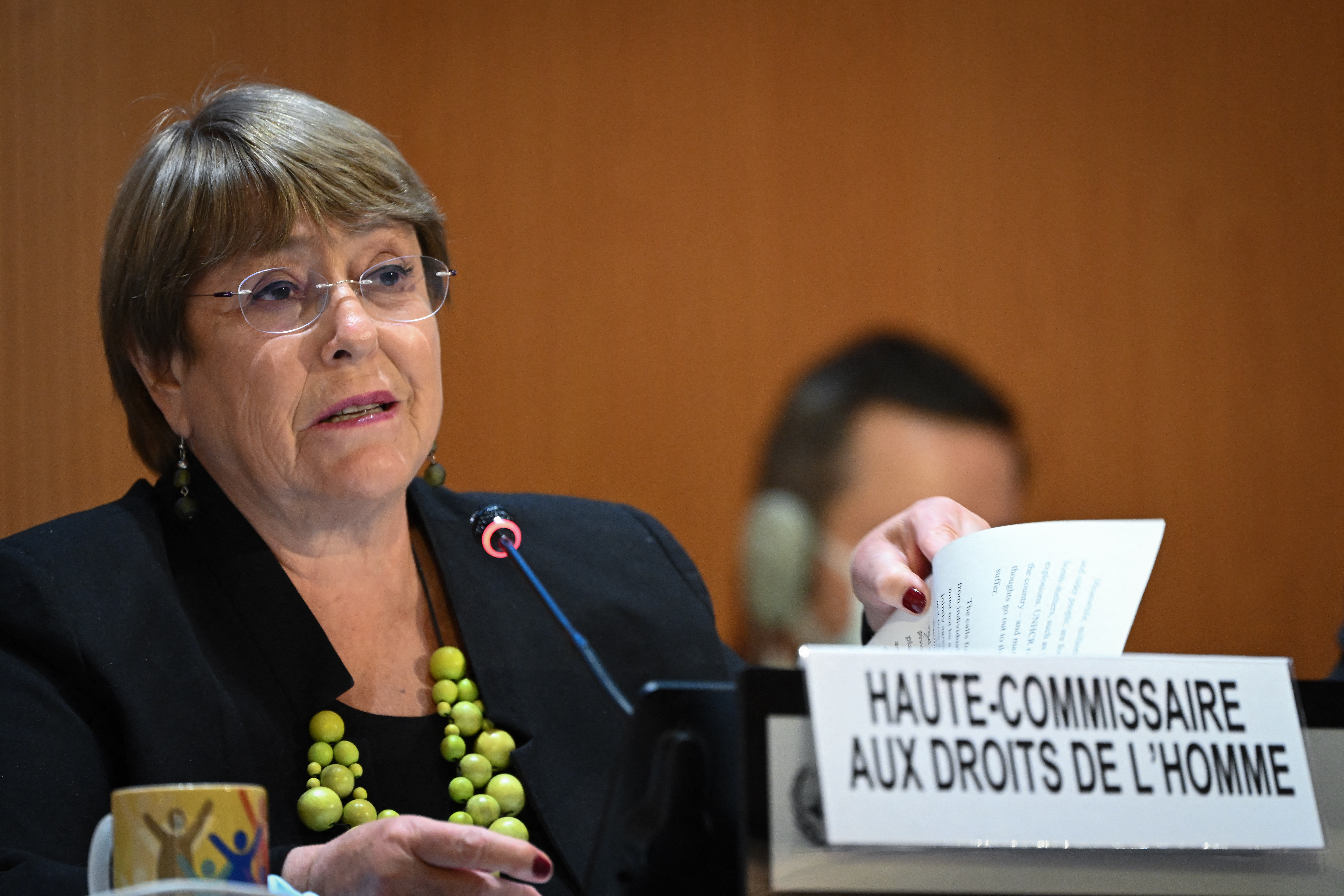 United Nations High Commissioner for Human Rights Michelle Bachelet delivers a speech at the opening of a session of the UN Human Rights Council in Geneva on Feb 28