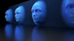 Blue computer-generated faces emerge from a wall