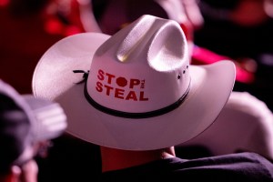 Person in a "Stop the Steal" cowboy hat at the Protect Our Elections Rally at the Arizona Federal Theater in Phoenix, AZ July 24, 2021. (Cassidy Araiza for The Washington Post via Getty Images)