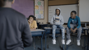 Third-graders Mekhi, Naeem, and Israel talk about the shooting at the Tops supermarket, a five-minute ride from their school.