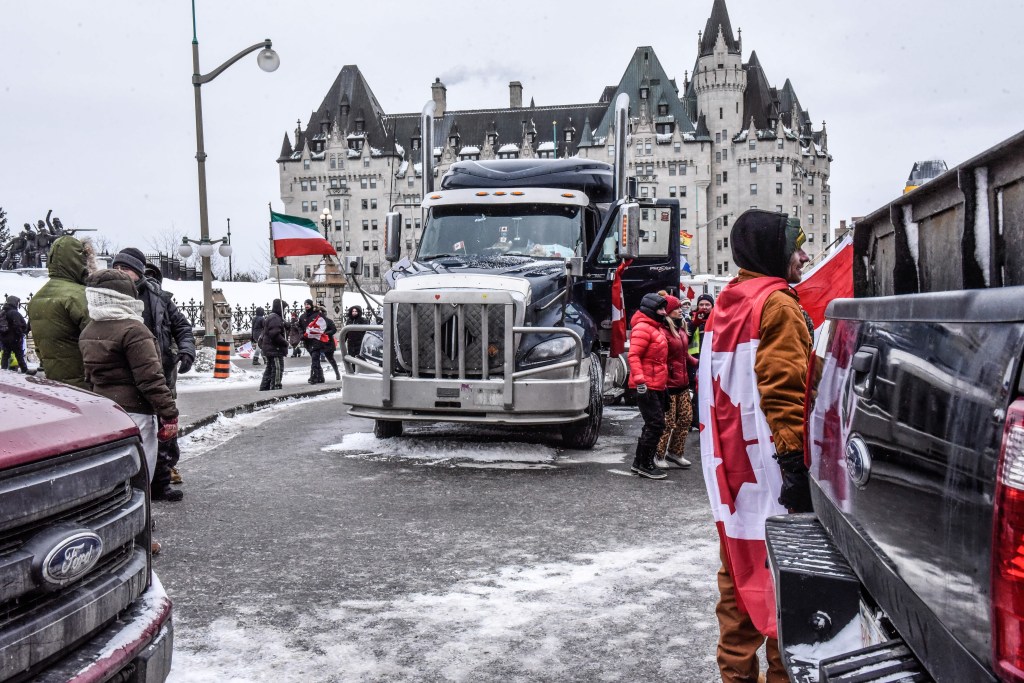 Protesters during a demonstration near Parliament Hill in Ottawa, Ontario, Canada, on Saturday, Feb. 12, 2022.